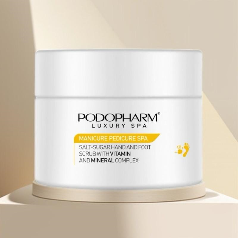 Podopharm Peeling aus Salz und Zucker für Hände und Füsse mit einem Komplex aus Vitaminen und Mineralien.